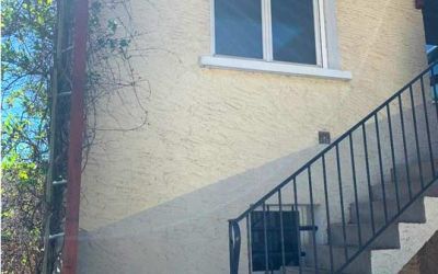 Ecothermic pose de panneaux isolants 32 mm, finition crépi quartz brun et craie blanche à Aurillac